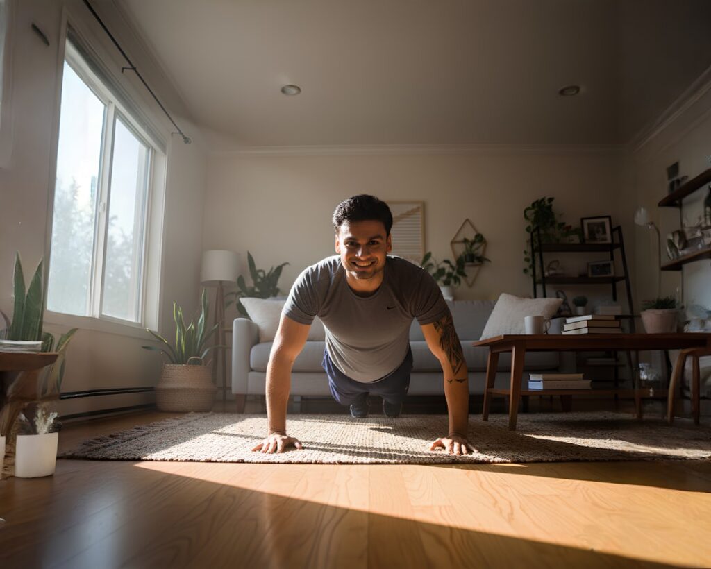 Man doing push-ups in a sunlit living room.